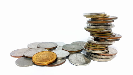 Pile of silver and copper coins on white background, Thai coins