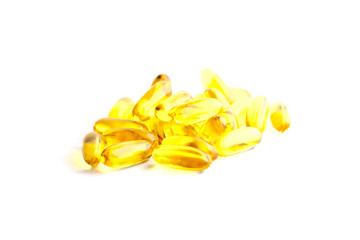 Fish oil capsules source of high omega-3 and vitamin for health care isolated on white background.
