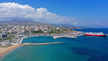 Fototapeta na wymiar Aerial drone bird's eye panoramic view of famous port and city of Rafina with passenger ferries travel to Aegean islands, Attica, Greece