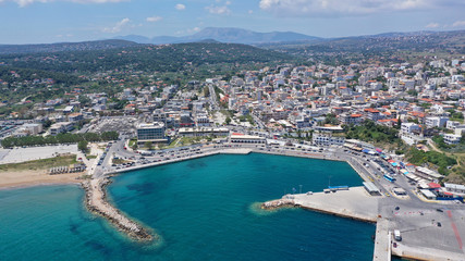 Aerial drone bird's eye panoramic view of famous port and city of Rafina with passenger ferries travel to Aegean islands, Attica, Greece