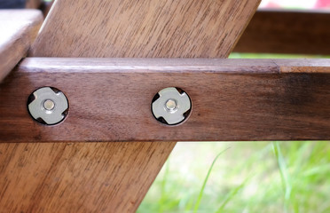 T-nuts Fasterner on a Wooden Picnic Table.