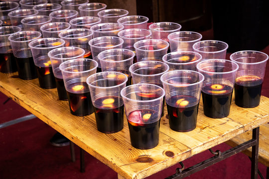 Group Of Plastic Cups Filled With Wine With Lemon Slices For A Party