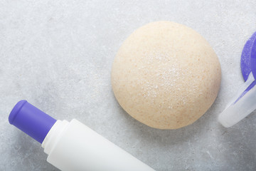 Risen or proved yeast dough for bread or pizza on a floured slate surface