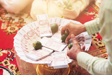 Thai banknotes on goldentray for Wedding money in Thailand traditional
