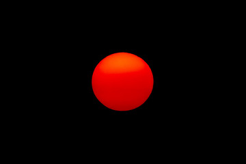 The evening or morning sun can be seen with the naked eye. The sun is red because of the dust and atmosphere.