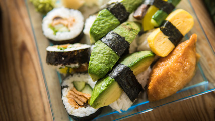 Asian food, sushi rolls on a table