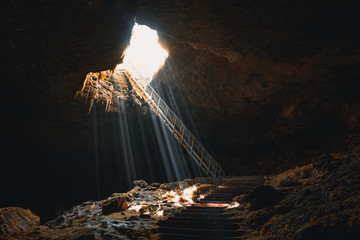 Stairs leading into a cave under the ground.