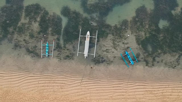 Aerial view from Karang Beach Sanur Bali with beautiful white sand and traditional Balinese boats