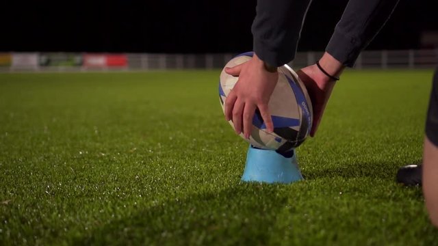 Cinematic Rugby Ball Placed For Penalty Kick, Slow Motion In Stadium