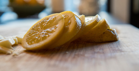 Lemon slices on a wooden table
