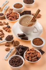 Obraz na płótnie Canvas Natural cocoa beans and hot chocolate