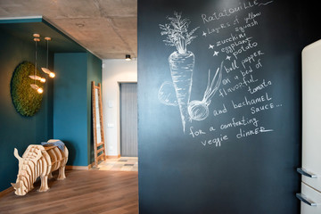 Lettering chalkboard wall with recipe in the kitchen.