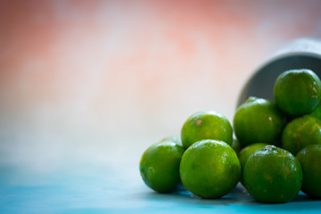 Lots of fresh green lemons fruits