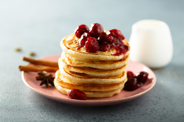 Homemade pancakes with spicy cherry sauce