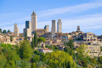 Fototapeta na wymiar View of the towers of medieval San Gimignano on a sunny September afternoon. Italy