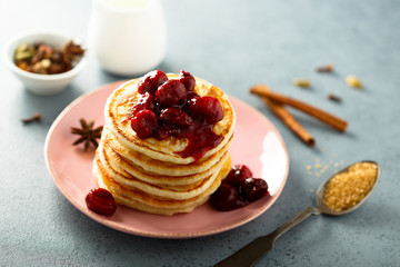 Homemade pancakes with spicy cherry sauce