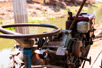 Fototapeta premium Close up machine for lowing field, tractor