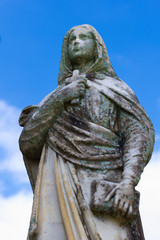 Imagem de Santa com Cruz e Livro 