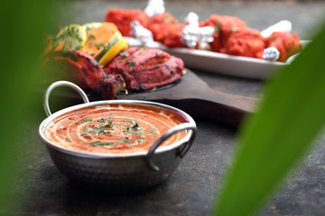 Red curry, aromatic curry with mango and tomatoes. Traditional Asian cuisine.