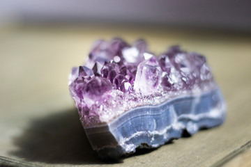 beautiful amethyst on wood background