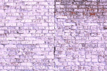 Unusual bright saturated abstract purple background from old brick wall in retro style
