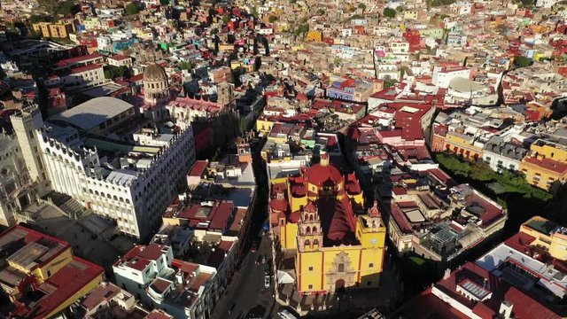 Cinematic Drone Aerial Tilt Down Shot of Guanajuato City Center Central Mexico With Basilica Cathedral Plaza De La Paz and University 4k