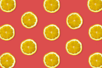 Creative pattern made of lemon. top view of fruit fresh limes slices on colorful background.
