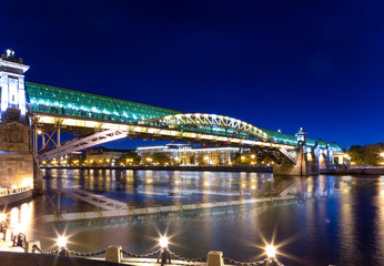 Fototapeta na wymiar View of the Pushkinsky (Andreevsky) Bridge and Moskva River (at night). Moscow, Russia