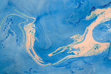 Blur marbling blue-yellow texture. Creative background with abstract oil painted handmade surface. Liquid paint.