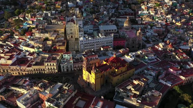 Drone Aerial Flying Around Basilica Colegiata De Nuestra Senora Cathedral and University of Guanajuato Historic Mining City in Central Mexico 4k