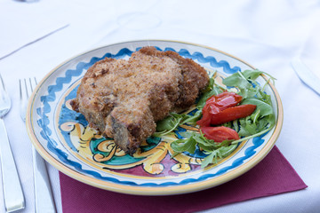 Cutlet with arugula