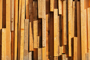 Plank walls many sizes nailed to be a beautiful order For the background.wood Light yellow gray red