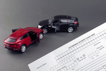 Car crash scene and car insurance document. cheap car insurance concept. gray background