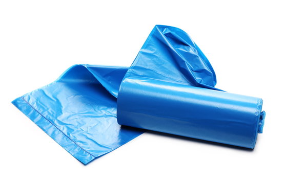 Blue Plastic Garbage Bag Roll Isolated On White Background