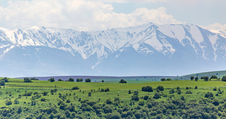 Snowy peaks of mountains in spring in Kazakhstan
