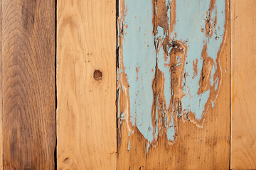 Wooden texture. Old grunge light textured wooden background with blue paint. The surface of the old brown wood texture