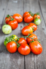 tomatoes on wooden background