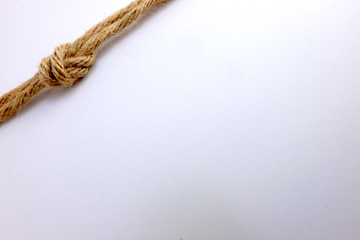 Bundle of jute rope on white background