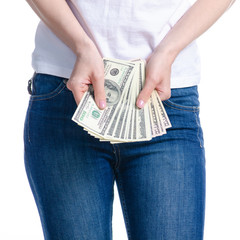 Woman holding in hand money dollars on white background. Isolation