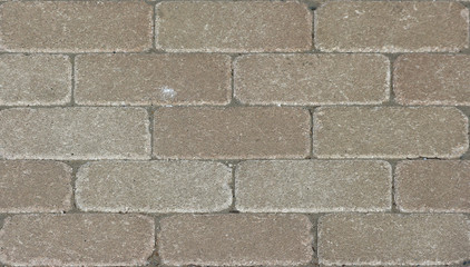 aged weathered brown stone paving walking way surface background.
