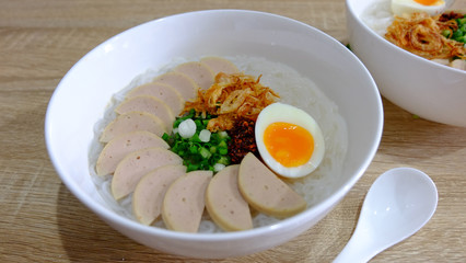 Vietnamese noodle soup in white bowl closeup shot