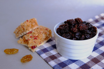 Dried black raisins and snack bar