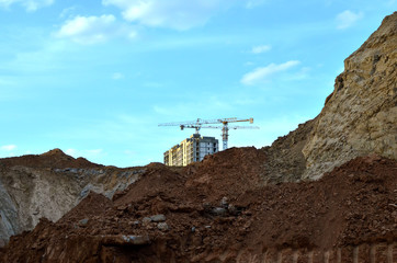 Fototapeta na wymiar Foundation pit for the construction of apartment building - Image