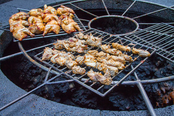 Chicken legs on the grill grill over the natural heat of a volcano in the El Diablo Canary Islands National Park. Spain Lanserote