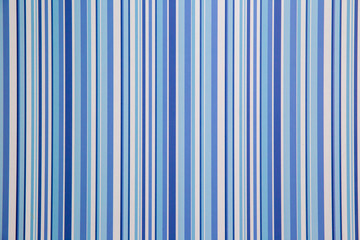Abstract dark blue wall background with vertical line pattern using for wallpaper.   Vertically striped Wallpaper. 