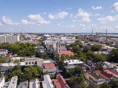 Aerial view of downtown Charleston, South Carolina with historic churches.