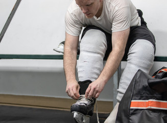 Hockey player in locker room