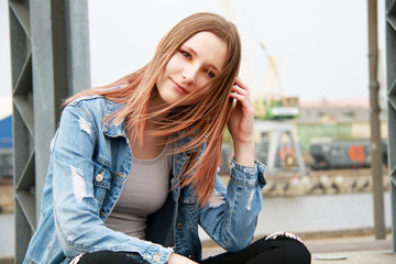 Urban style portrait of young caucasian woman