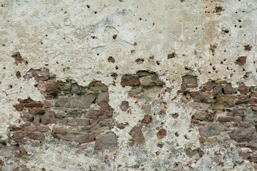 The  high resolution texture of the old brick wall with showered plaster and clay putty. Useful for the texture of the old castle or walls in design, architecture and game development
