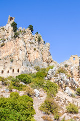 Fototapeta na wymiar Beautiful St. Hilarion Castle in Cypriot Kyrenia region, Northern Cyprus captured on a vertical photography. Located on the Kyrenia mountain range, originally a monastery from 10th century